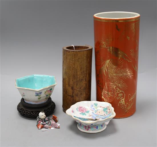 Two Chinese famille rose dishes, a figure of a boy, a porcelain brush pot and a bamboo brush pot tallest 28cm